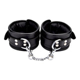 Bound leather wrist restraints - bondage restraints peaches and screams