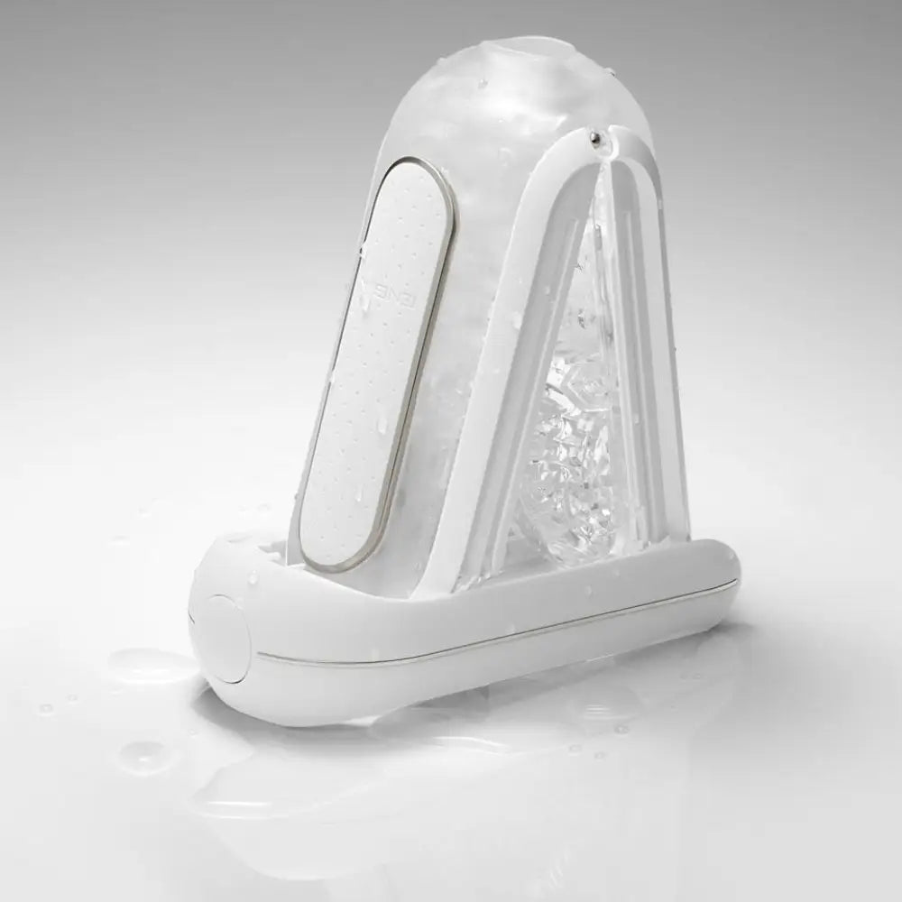 Tenga stretchy white waterproof rechargeable vibrator stroker - peaches and screams
