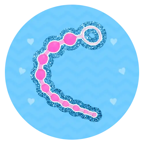 A pink and blue glittery toy chain with a circular loop at one end.